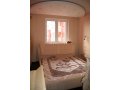 Кровать 1м80х2м00 с кожаным изголовьем, с матрасом (б/у) в городе Котельники, фото 1, Московская область