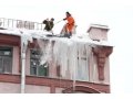 Сброс снега с крыш в городе Томск, фото 1, Томская область