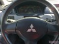 Mitsubishi Lancer,  седан,  2009 г. в.,  пробег:  70000 км.,  автоматическая,  1.3 л в городе Омск, фото 8, стоимость: 350 000 руб.