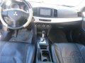 Продается Mitsubishi Lancer 2008 г. в.,  1.8 л.,  АКПП,  91264 км.,  хорошее состояние в городе Тюмень, фото 1, Тюменская область