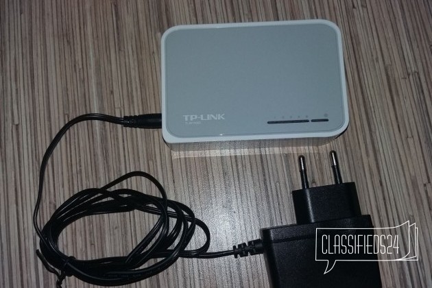 Коммутатор TP-link TL-SF1005D в городе Кыштым, фото 1, Сетевое оборудование