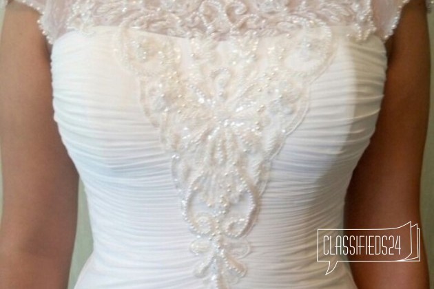 Продается свадебное платье с коротким рукавом в городе Москва, фото 5, телефон продавца: +7 (987) 578-07-47